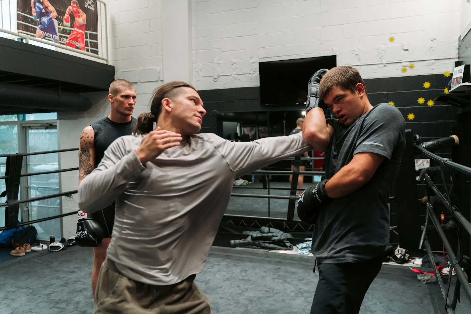 MMA pad work training at Mad Max's Academy in Columbus, Ohio